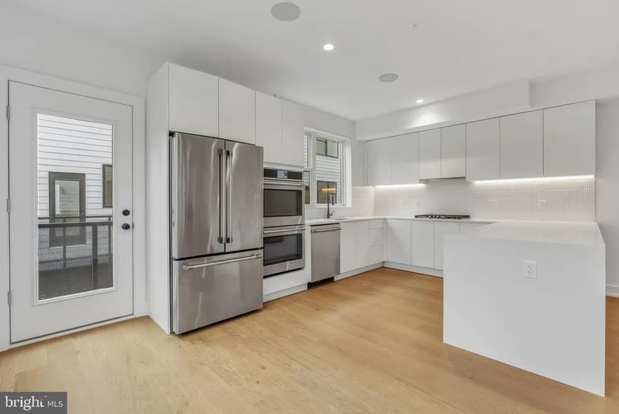 New-construction townhome kitchen at 650 Fairmount